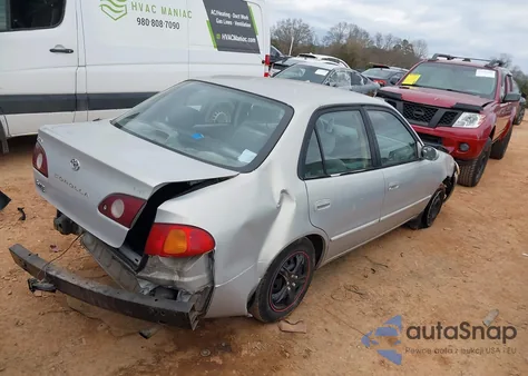 2001 Toyota Corolla Le z USA, uszkodzony, nr VIN 2T1BR12E71C507692